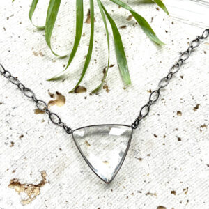 Edgy crystal quartz triangle necklace